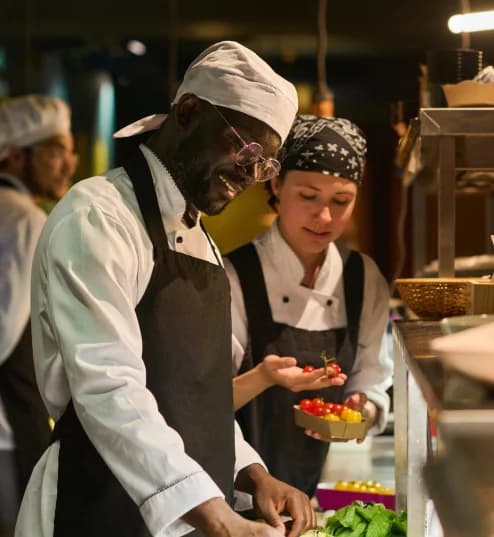 Happy Young African American Male Chef Mixing Fres 2023 11 27 05 00 41 Utc 1